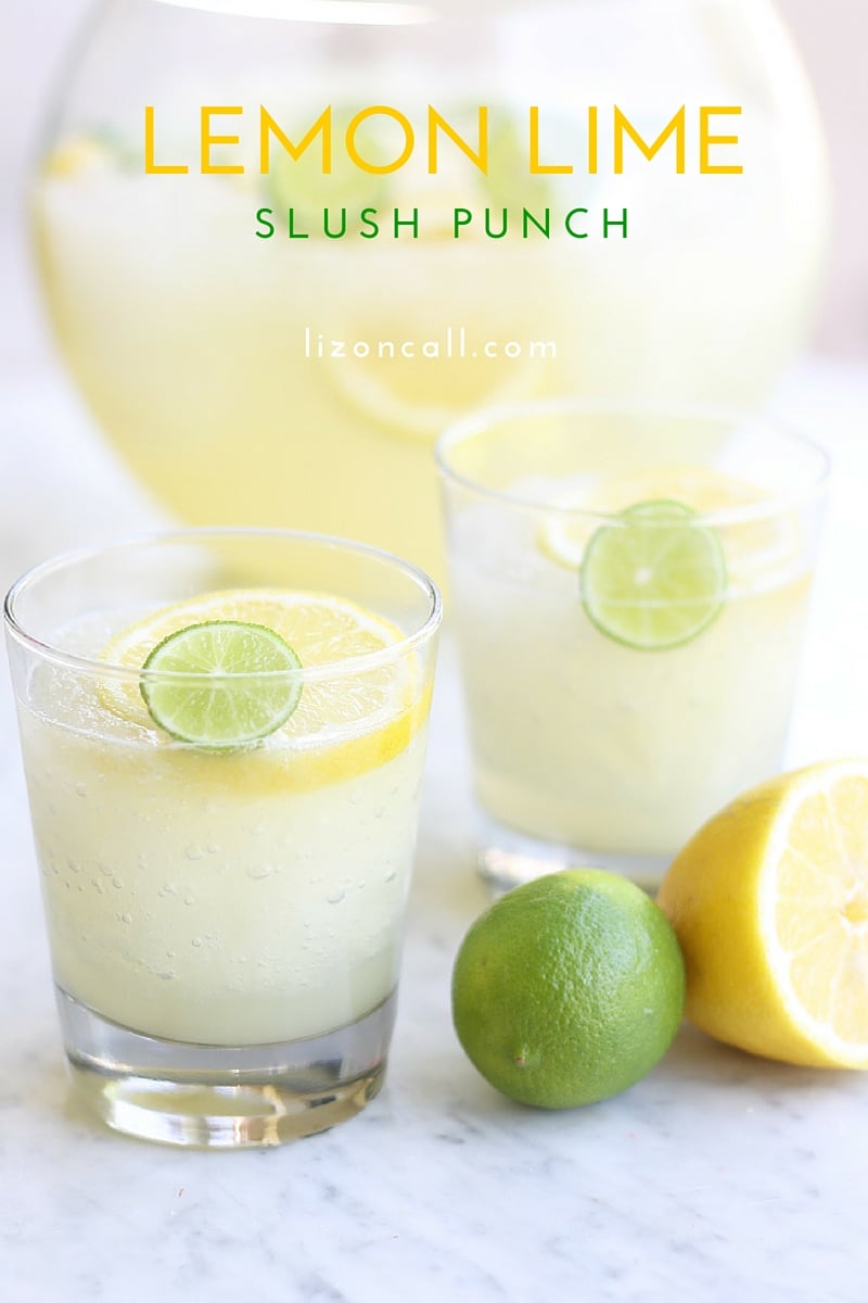 title image - lemon lime slush punch - image shows 2 glasses and of punch garnished with slices of lemon and key lime